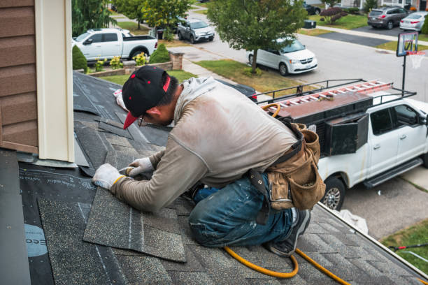 Professional Emergency Roof Repair technician working in Kalkaska, MI